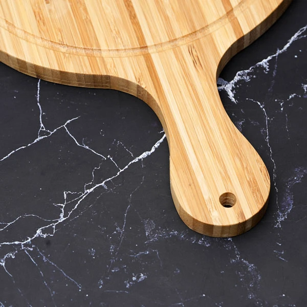 Thớt tre hình tròn có tay cầm